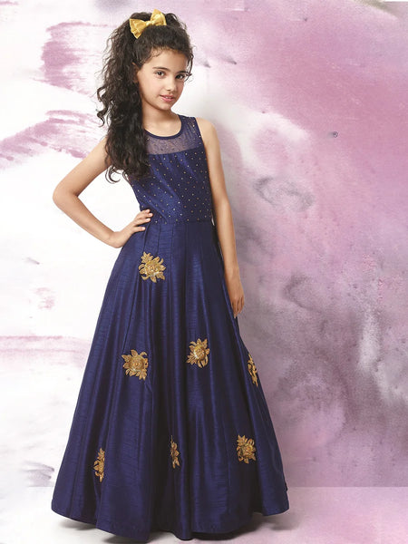 It’s a fancy navy Colored gown that comes with the back zip closure, a perfect wedding dress for girls. It features embellished floral detailing on the dress.