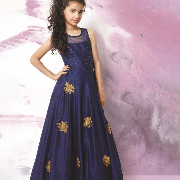  It’s a fancy navy Colored gown that comes with the back zip closure, a perfect wedding dress for girls. It features embellished floral detailing on the dress.