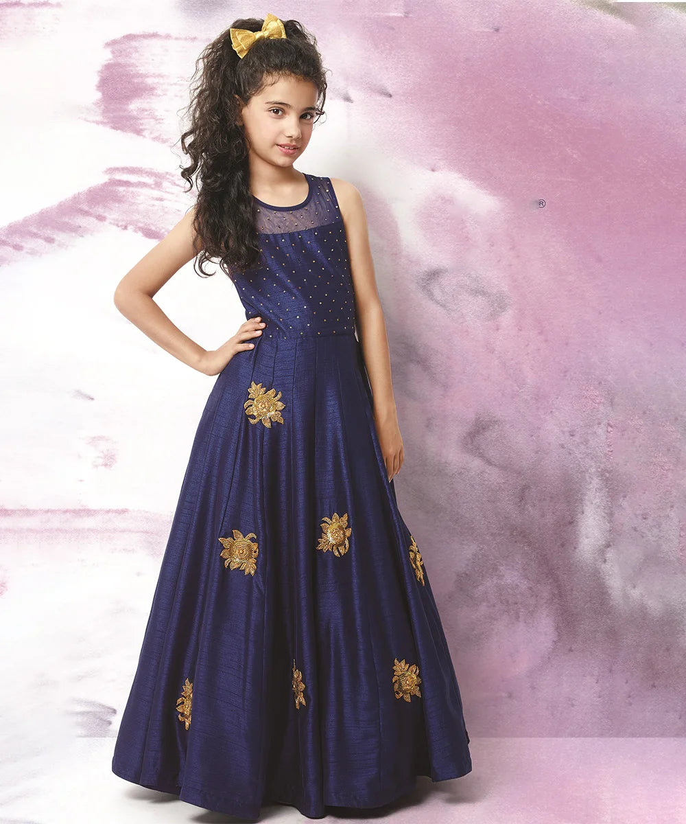  It’s a fancy navy Colored gown that comes with the back zip closure, a perfect wedding dress for girls. It features embellished floral detailing on the dress.