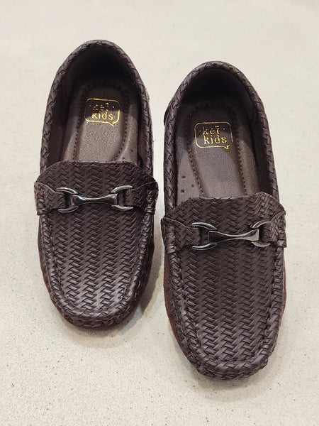 Pair of brown woven loafers on a light gray background
