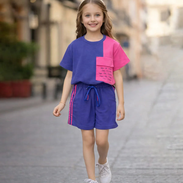 Young girl wearing a colorful outfit on a city street