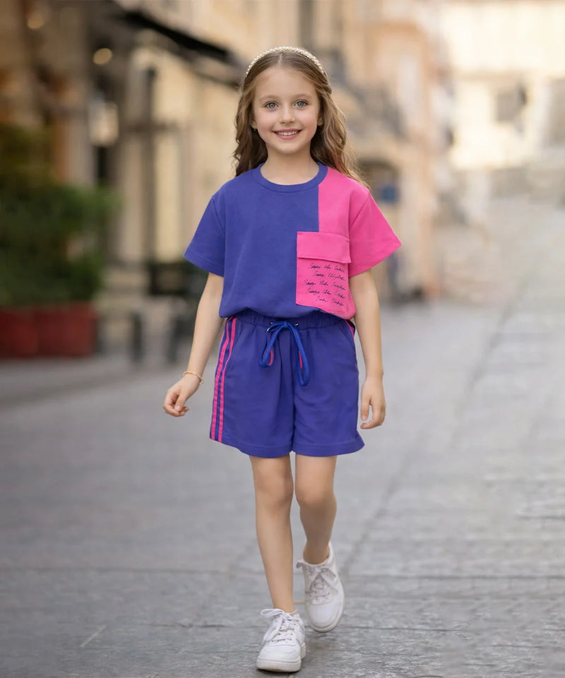 Young girl wearing a colorful outfit on a city street