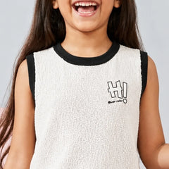 Child wearing a white sleeveless shirt with black trim and 'HI!' print on a gray background