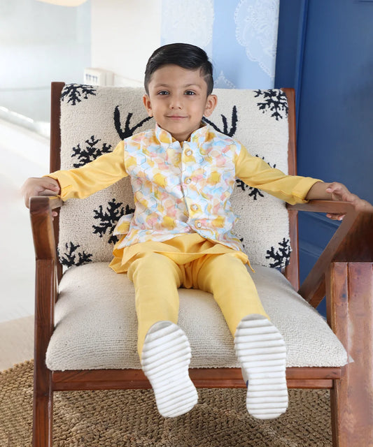 It is a Yellow-Colored kurta pyjama set teamed up with a matching waistcoat perfect for wedding functions.