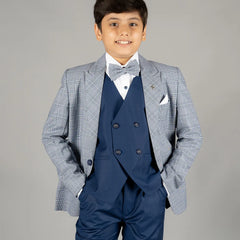 white shirt with blue waistcoat & pants, paired with checked light blue coat & a bow 