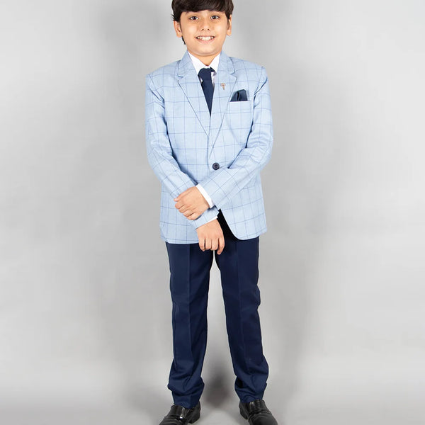 This suit set comes with a checkered blazer, a white shirt, a navy waistcoat and trousers for boys. In addition to that, it is teamed up with a cute broach and a navy blue pocket square.