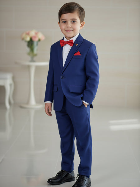 The creation is paired with a beautiful dotted white shirt, a red bow and straight trousers. It features a self-textured blazer with a nice small broach on it.