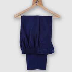 pants paired underneath navy blue coat suit set for boys 