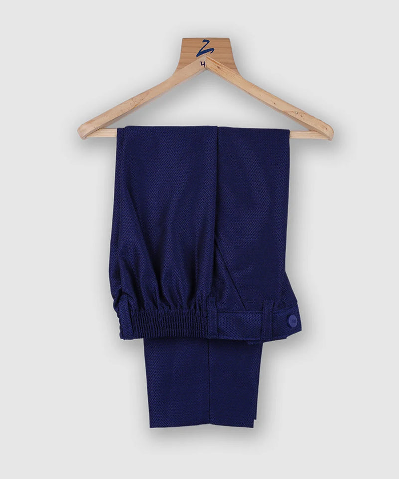 pants paired underneath navy blue coat suit set for boys 