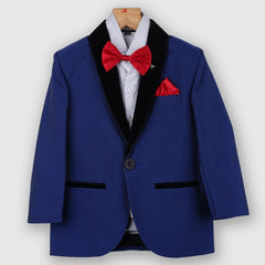 The creation is paired with a beautiful dotted white shirt, a red bow and straight trouser pants. It features a self-textured blazer with a nice small broach on its collar that’s created from a velvet fabric.