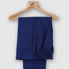 blue pants underneath the velvet coat suit set for boys