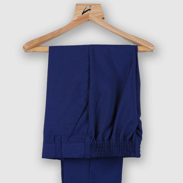 blue pants underneath the velvet coat suit set for boys