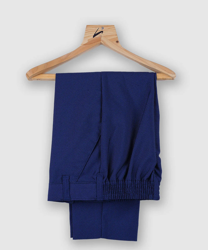 blue pants underneath the velvet coat suit set for boys