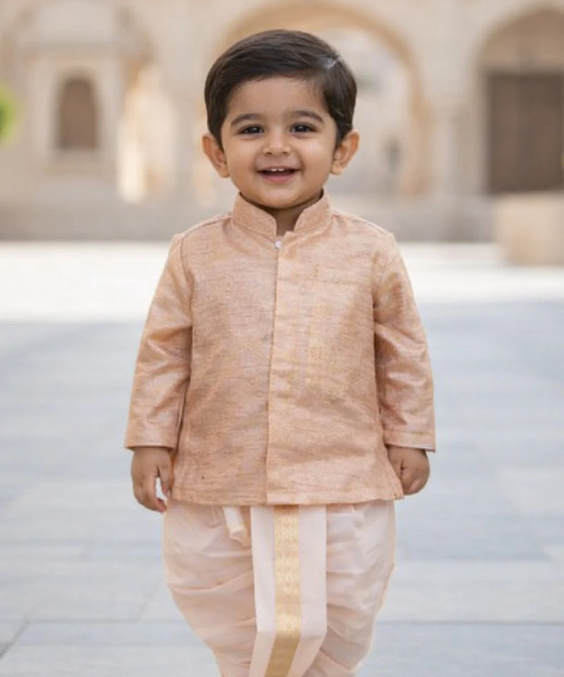 Child wearing a traditional outfit with a blurred architectural background