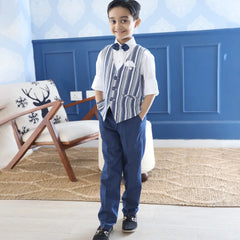 This white and blue coloured boys party clothes set consists of a smart waistcoat, matching pants and a white Coloured shirt.