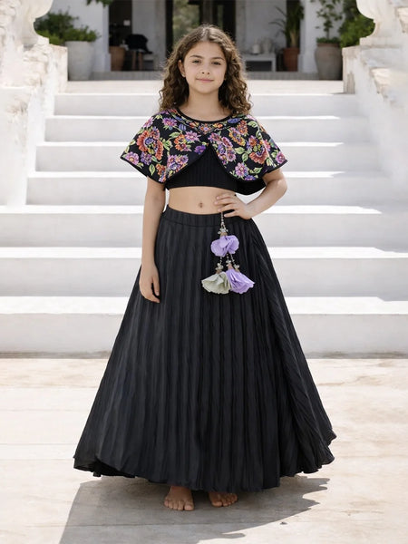girl wearing black embroidered lehenga