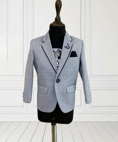 This blue coloured blazer set consists of a blazer and a white Colored T-shirt. It is a perfect wedding wear for boys. It features a broach, printed pocket square and elbow patch detailing on sleeves that adds grace to the look.