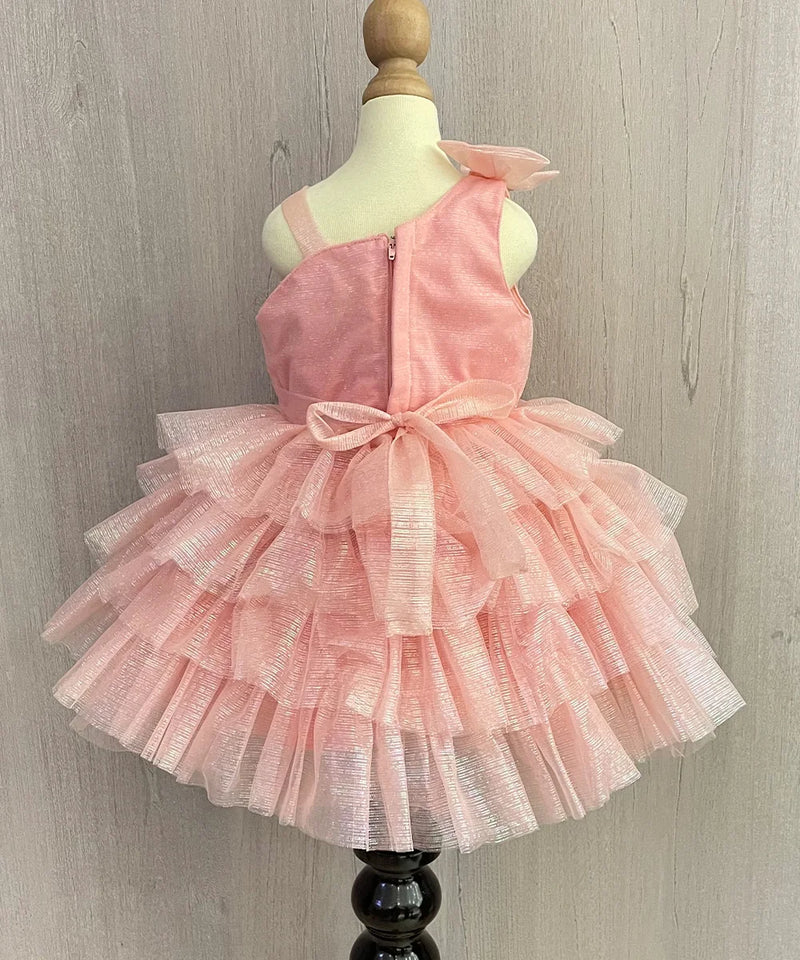 back view of peach shaded frock for baby girls 
