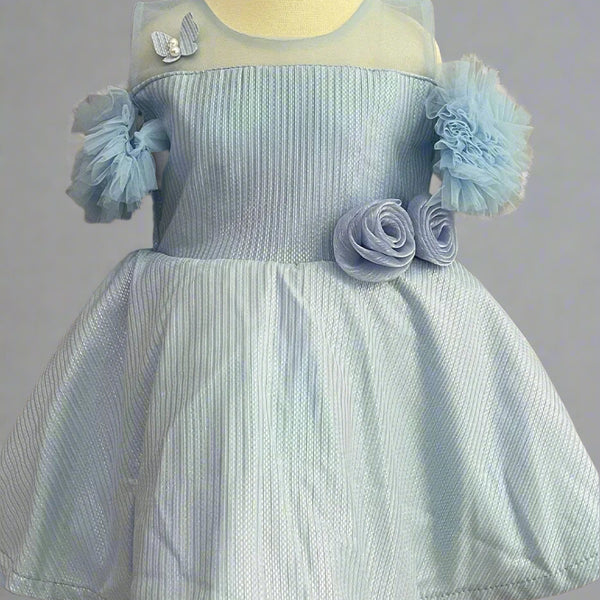 closeup view of sky blue shiny frock for baby girl