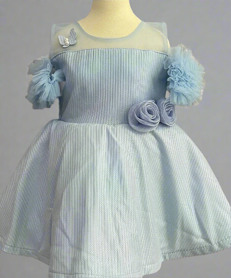 closeup view of sky blue shiny frock for baby girl