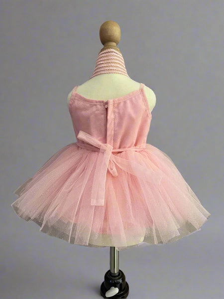 back view of peach frock for baby girls 