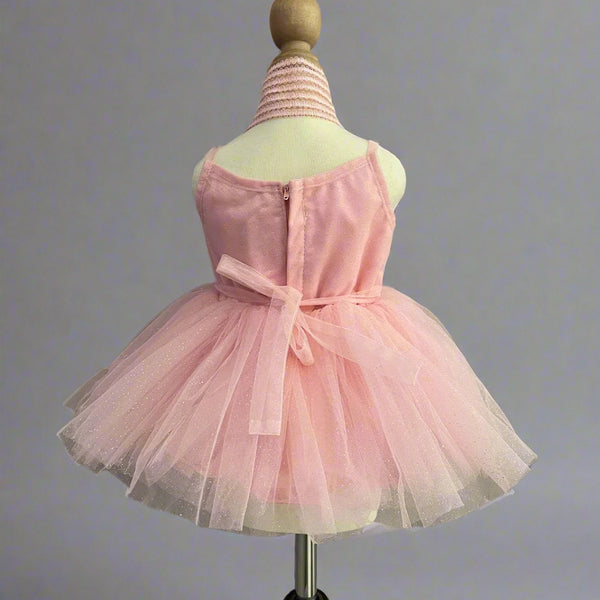 back view of peach frock for baby girls 