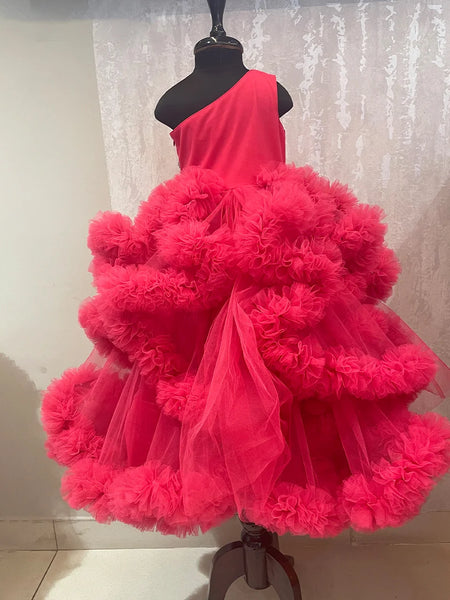 back view of pink one shoulder ruffled gown for girls 