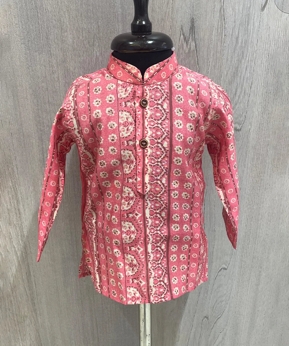 t is a pink printed kurta teamed up with a matching cream pyjama, and is the best boy's designer kurta-pyjama set.