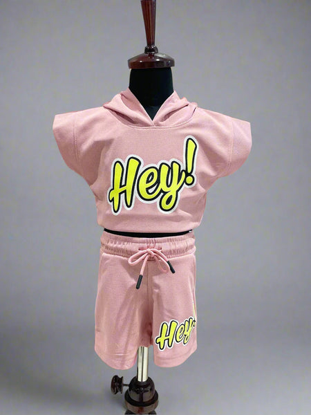 It Consists of a onion pink Colored hoodie top and shorts for girls. There is an embossed inscription on top and shorts both, moreover bottom comes with tie strings.