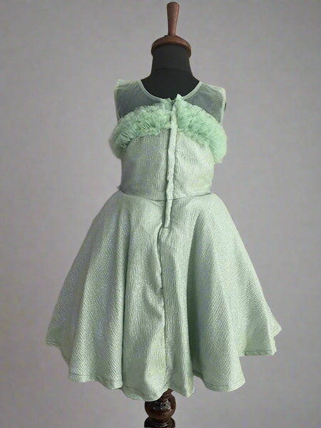 back view of pista green frock for girls