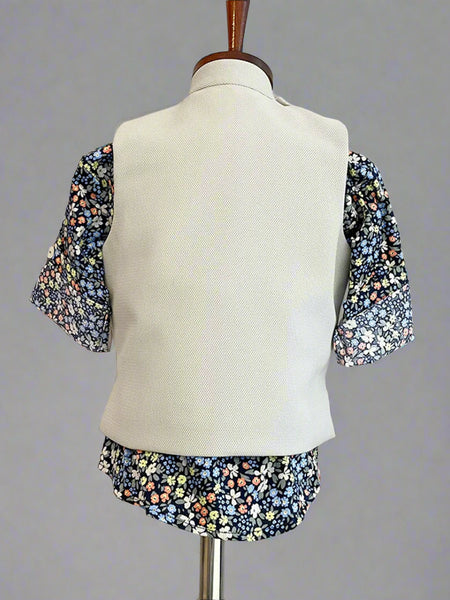 back view of cream waist coat suit set for boys 