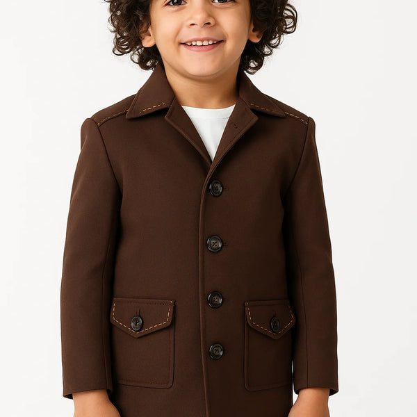 Child wearing a brown coat on a white background