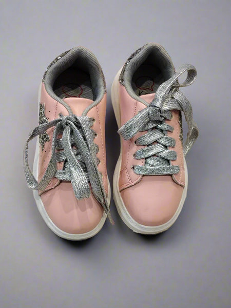 Close-up of trendy pink sneakers with silver glitter accents and padded collar, Jaipur