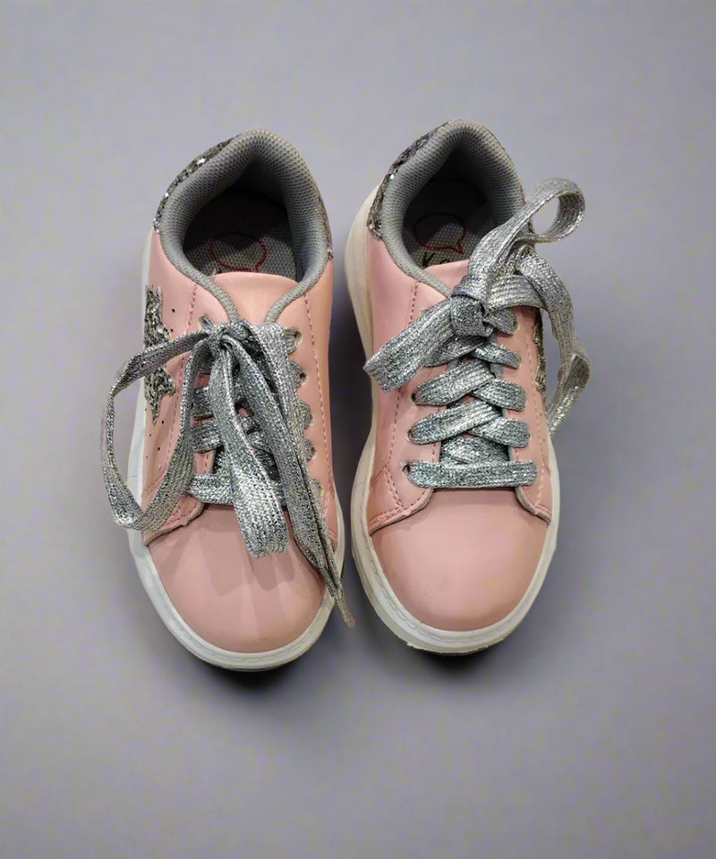 Close-up of trendy pink sneakers with silver glitter accents and padded collar, Jaipur