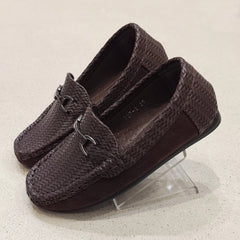 Pair of brown textured loafers on a clear stand against a light background