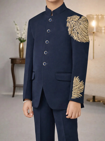 Navy suit with gold embroidery in a room setting