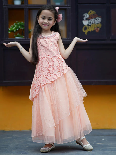 Peach Colored Laced Party Gown with stone and pearl work detailing on neck for Girls