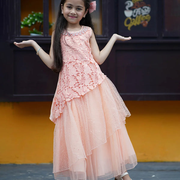 Peach Colored Laced Party Gown with stone and pearl work detailing on neck for Girls