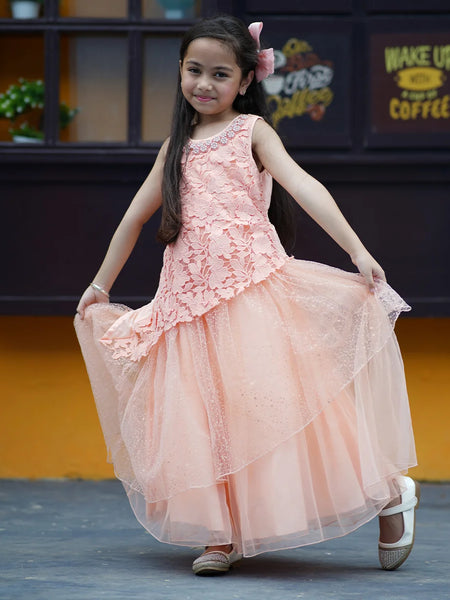 Peach Colored Laced Party Gown with stone and pearl work detailing on neck for Girls