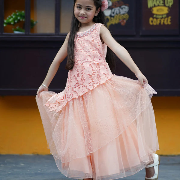 Peach Colored Laced Party Gown with stone and pearl work detailing on neck for Girls
