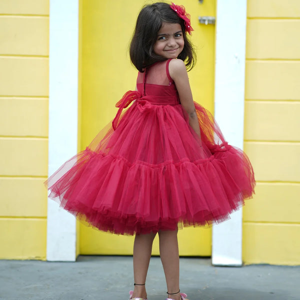 back view of red frilly frock for girls 