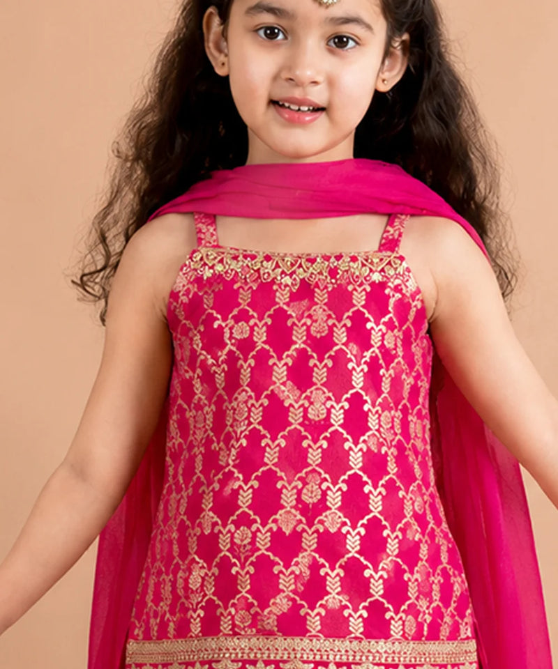 Girls ethnic sharara set with flared sharara and dupatta.