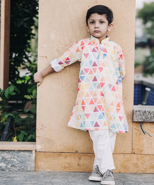 It is a multi colored printed kurta teamed up with a matching pyjama, that can be creatively styled with ethnic shoes and is the best boy's designer kurta-pyjama set.