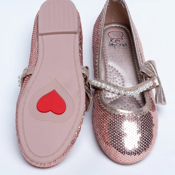 It's a pair of rose-gold Colored party-wear sandals for wedding parties. It features Patterned synthetic outsole, pearl and bow detailing on the belt.