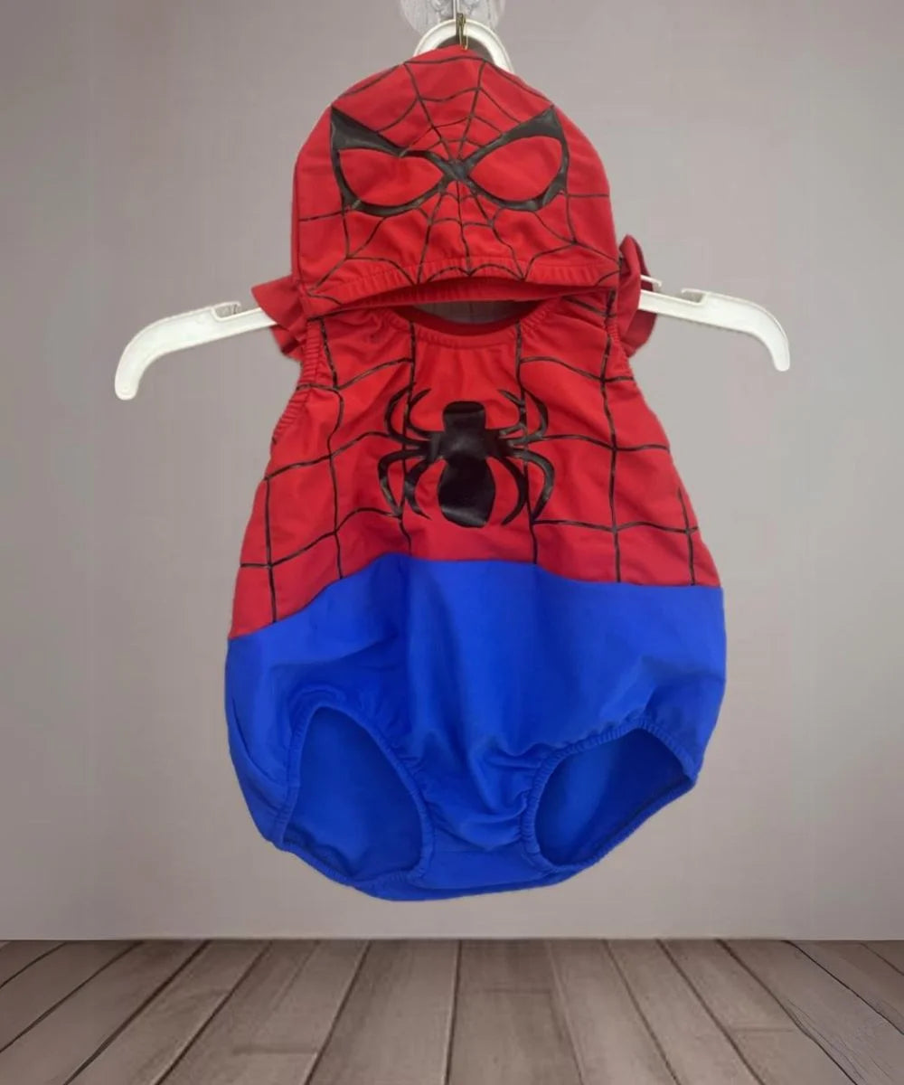 It’s a cute kids pool party wear swimsuit with a Spider-Man print detailing in red and blue colour.