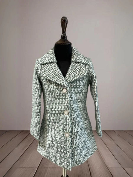 This green Colored kids winter wear consists of a self-textured warm coat with stylized matching buttons on it.