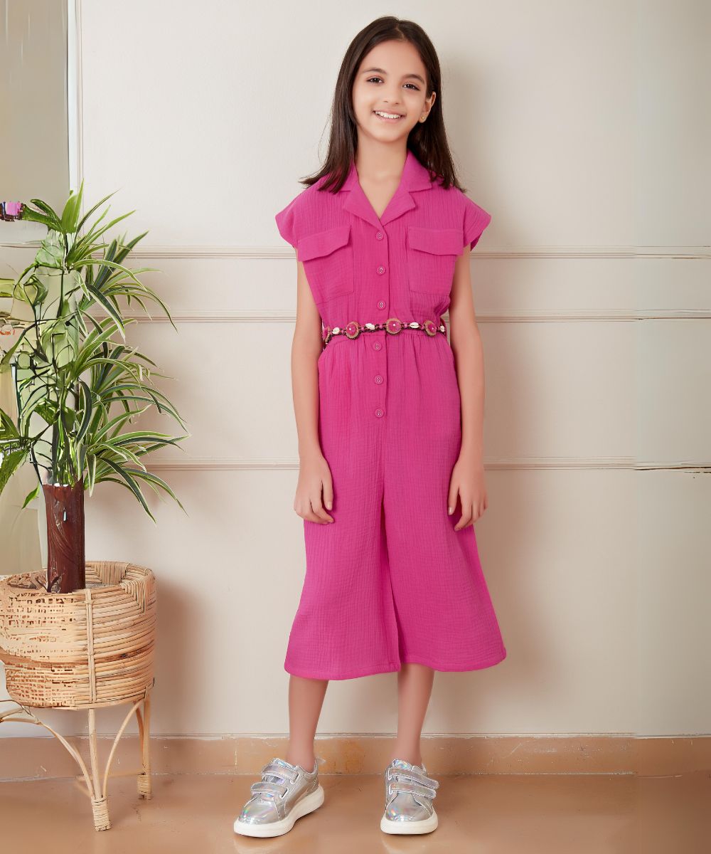  It is a pink Colored Jumpsuit with an elasticated waist for girls. It features a matching belt.