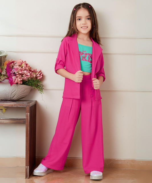 It's a pink and green colored crop top, pants and jacket set for a little girl. This dress has a beautiful Inscription on a crop top and the outfit comes with a matching sling bag.