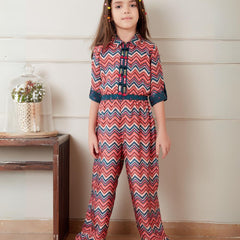 It is a multi colored kids party wear that consists of a printed jumpsuit with an elasticated waist. It features work detailing on the placket.