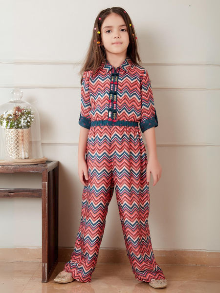 It is a multi colored kids party wear that consists of a printed jumpsuit with an elasticated waist. It features work detailing on the placket.
